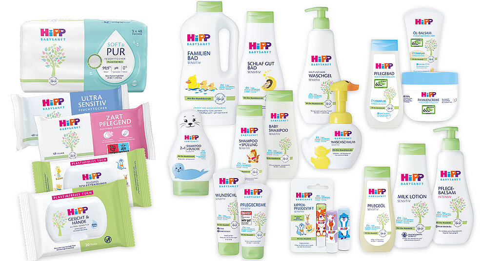 A collection of baby care products from the brand 'HiPP', including baby wipes, shampoo, lotion, and other personal care items.